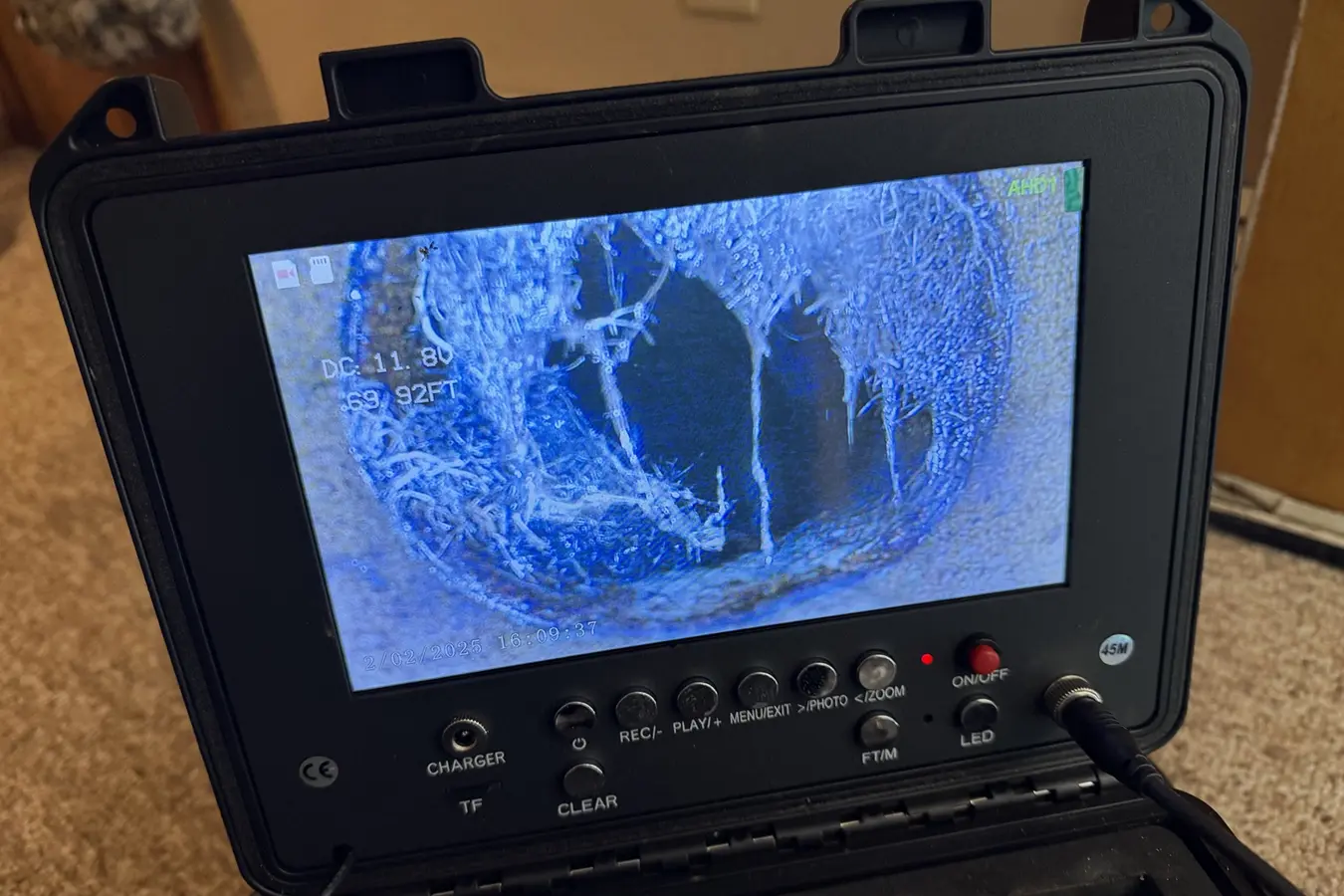 Sewer-camera monitor showing conditions inside a drain line